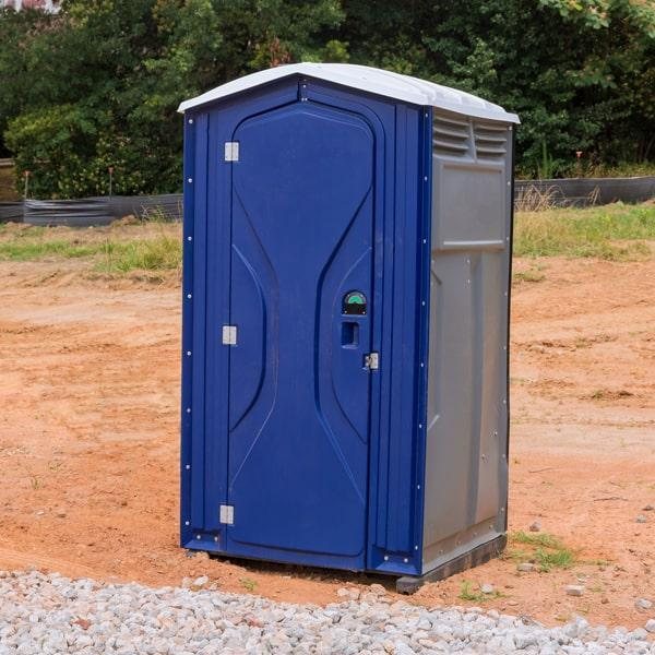 Deluxe flushable portable toilet unit exterior at an outdoor event in O'Fallon, MO